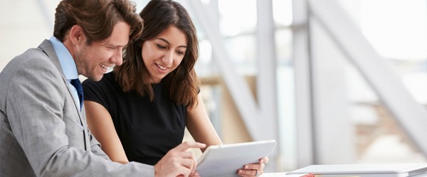 Man and Woman with Tablet